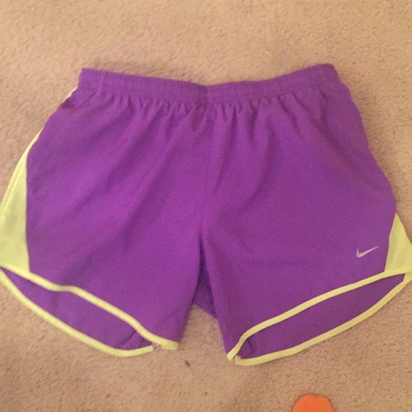 purple and yellow nike shorts